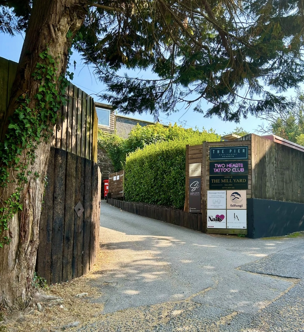 The tree-lined lane leading to the Penryn studio at The Mill Yard